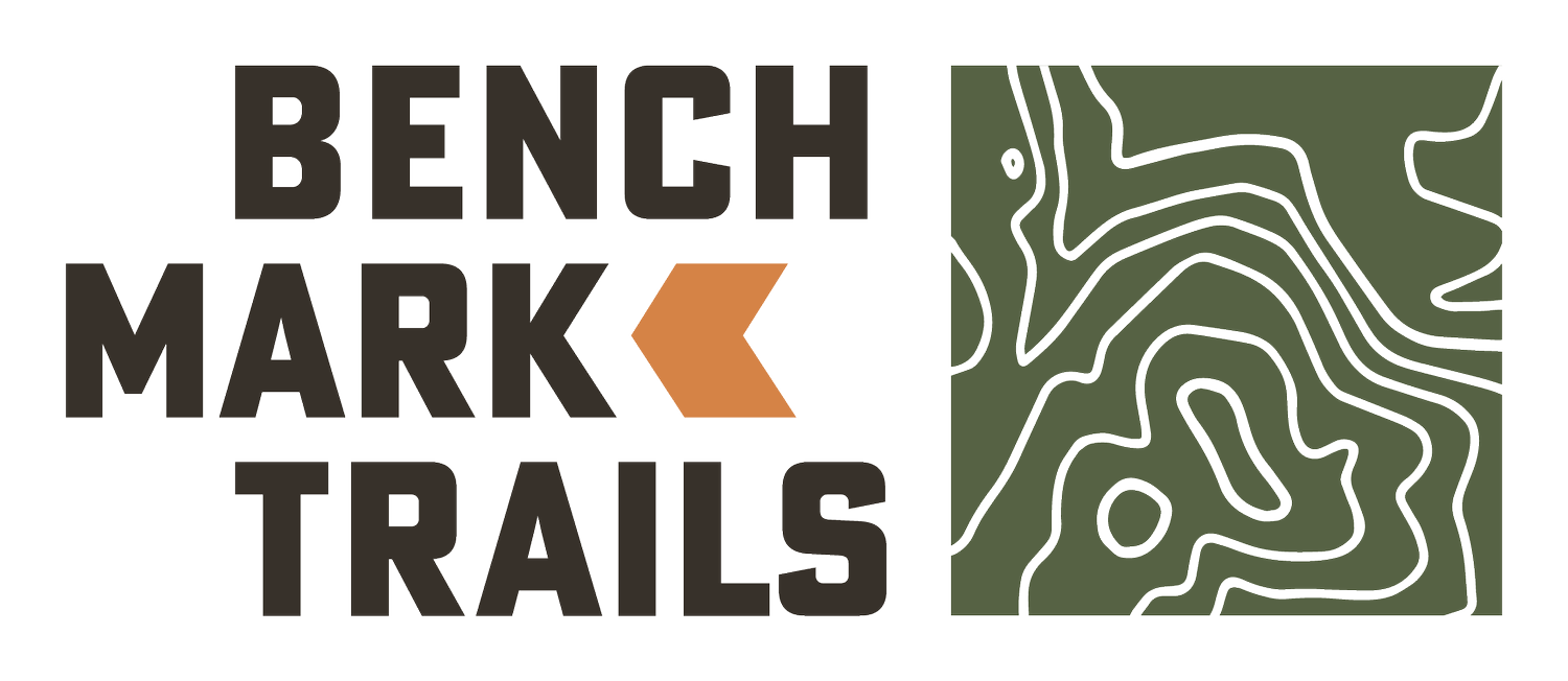 BENCHMARK TRAILS LLC logo