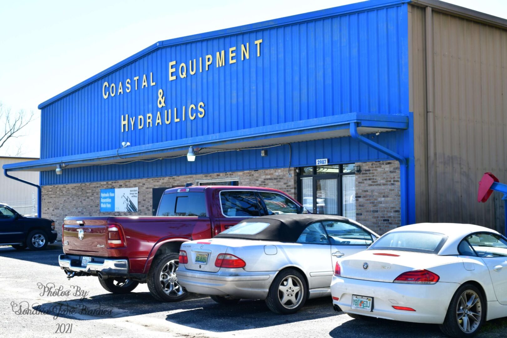 COASTAL EQUIPMENT AND HYDRAULICS, INC. logo